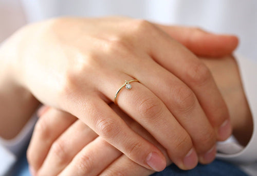 14k Gold Thin Ring with a 0.05ctw Round White Diamond Dangling Charm Ring - Round Cut Diamond Dangle Ring / Stacking Diamond Ring - Jalvi & Co. 