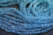 Load image into Gallery viewer, 1/2 Strand, Super Finest Quality Sky Blue Topaz Faceted Rondelles Size 4mm - Jalvi &amp; Co.