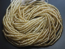 Load image into Gallery viewer, 13&#39;&#39; Strand,Champagne Color Natural Zircon Micro Faceted Rondells, Size 3.10mm - Jalvi &amp; Co.