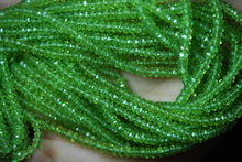 Load image into Gallery viewer, 14 Inches Strand Green Peridot Faceted Rondelles Large Size 5mm - Jalvi &amp; Co.