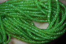 Load image into Gallery viewer, 14 Inches Strand Green Peridot Faceted Rondelles Large Size 5mm - Jalvi &amp; Co.