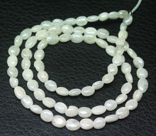 Load image into Gallery viewer, 15 inches, 6mm, Natural Silverite Smooth Polished Oval Loose Gemstone Beads Strand - Jalvi &amp; Co.