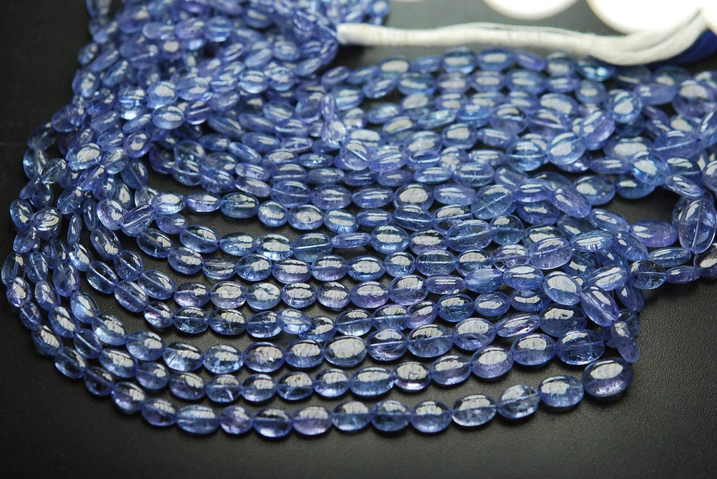 16 Inch Strand, Finest Quality, Natural Tanzanite Smooth Oval Nuggets, 5-7mm Size - Jalvi & Co.