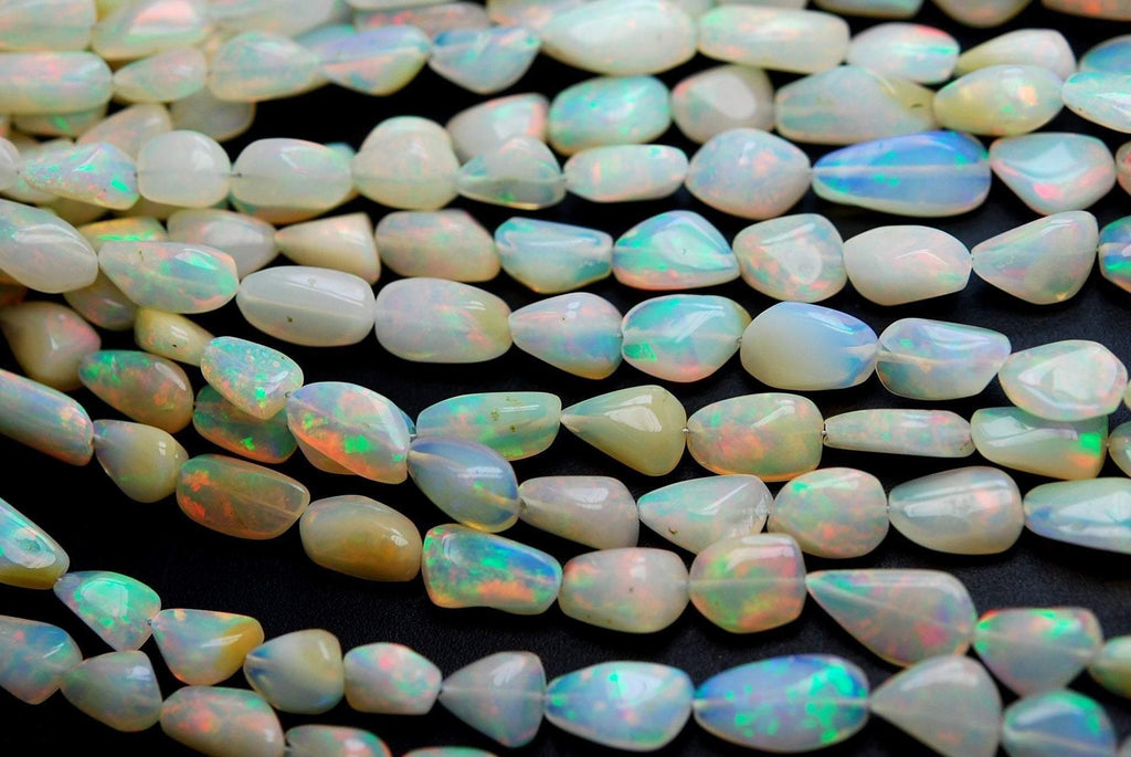 16 Inch Strand Super Fire White Ethiopian Opal Smooth Polished Nuggets, Size 6-13mm - Jalvi & Co.