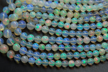 Load image into Gallery viewer, 18.5 Inches, Natural Ethiopian Opal Smooth Round Rondelles,Size 4-7.5mm - Jalvi &amp; Co.