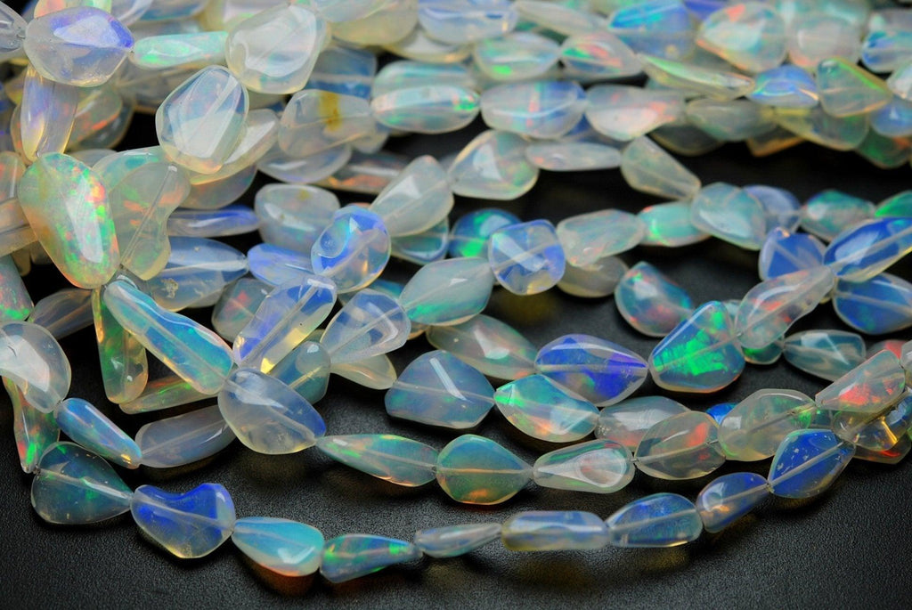 4 Inch Strand,Super Fire White Ethiopian Opal Smooth Polished Nuggets, Size 7-12mm - Jalvi & Co.