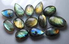 Load image into Gallery viewer, 546 Carats, 13 Pieces, Flash Rainbow Yellow Flash Labradorite Smooth Large Cabuchon 30-41mm - Jalvi &amp; Co.