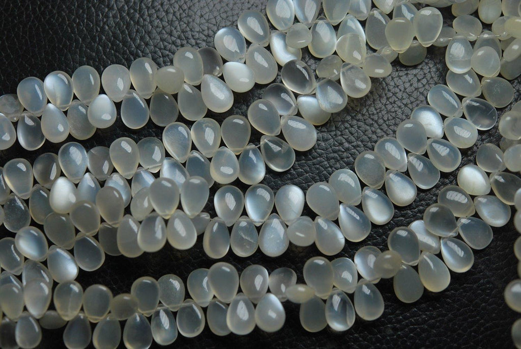 7 Inch Finest Quality, White Ceylon Moonstone Smooth Pear Shape Briolette's, 10mm Calibrated Size - Jalvi & Co.