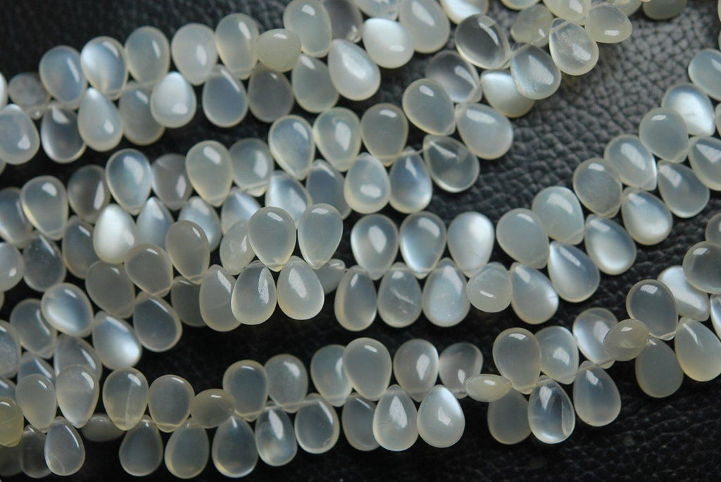 7 Inch Finest Quality, White Ceylon Moonstone Smooth Pear Shape Briolette's, 10mm Calibrated Size - Jalvi & Co.