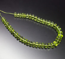 Load image into Gallery viewer, 7 inches, 6-7mm, AAA Grade Green Peridot Smooth Rondelle Loose Gemstone Beads - Jalvi &amp; Co.