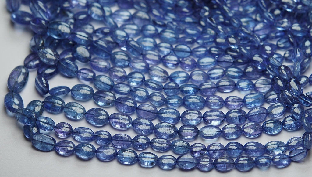 8 Inch Strand, Finest Quality, Natural Tanzanite Smooth Oval Nuggets, 5-7mm Size - Jalvi & Co.