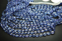 Load image into Gallery viewer, 8 Inch Strand, Finest Quality, Natural Tanzanite Smooth Oval Nuggets, 5-7mm Size - Jalvi &amp; Co.