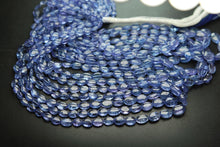 Load image into Gallery viewer, 8 Inch Strand, Finest Quality, Natural Tanzanite Smooth Oval Nuggets, 5-7mm Size - Jalvi &amp; Co.