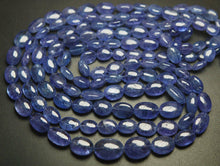 Load image into Gallery viewer, 8 Inch Strand, Finest Quality, Natural Tanzanite Smooth Oval Nuggets, 8-10mm Size - Jalvi &amp; Co.