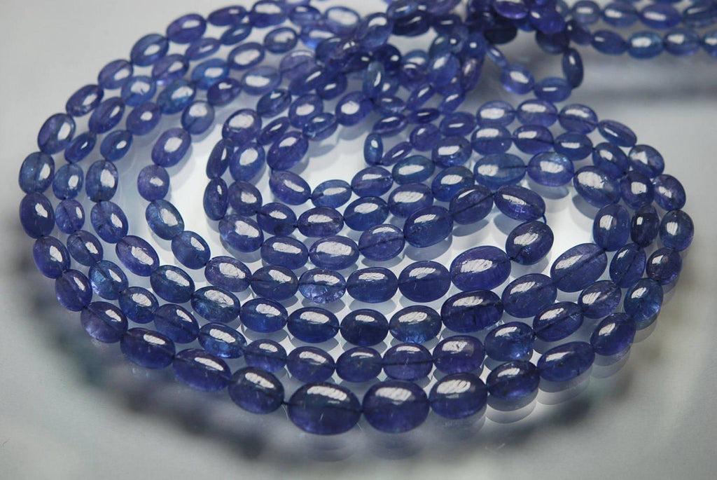 8 Inch Strand, Finest Quality, Natural Tanzanite Smooth Oval Nuggets, 8-10mm Size - Jalvi & Co.