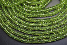 Load image into Gallery viewer, Gems Quality Strand, 6.5 Inches Strand, Aaa Super Rare Peridot Faceted Rondelles Large Size 4mm - Jalvi &amp; Co.