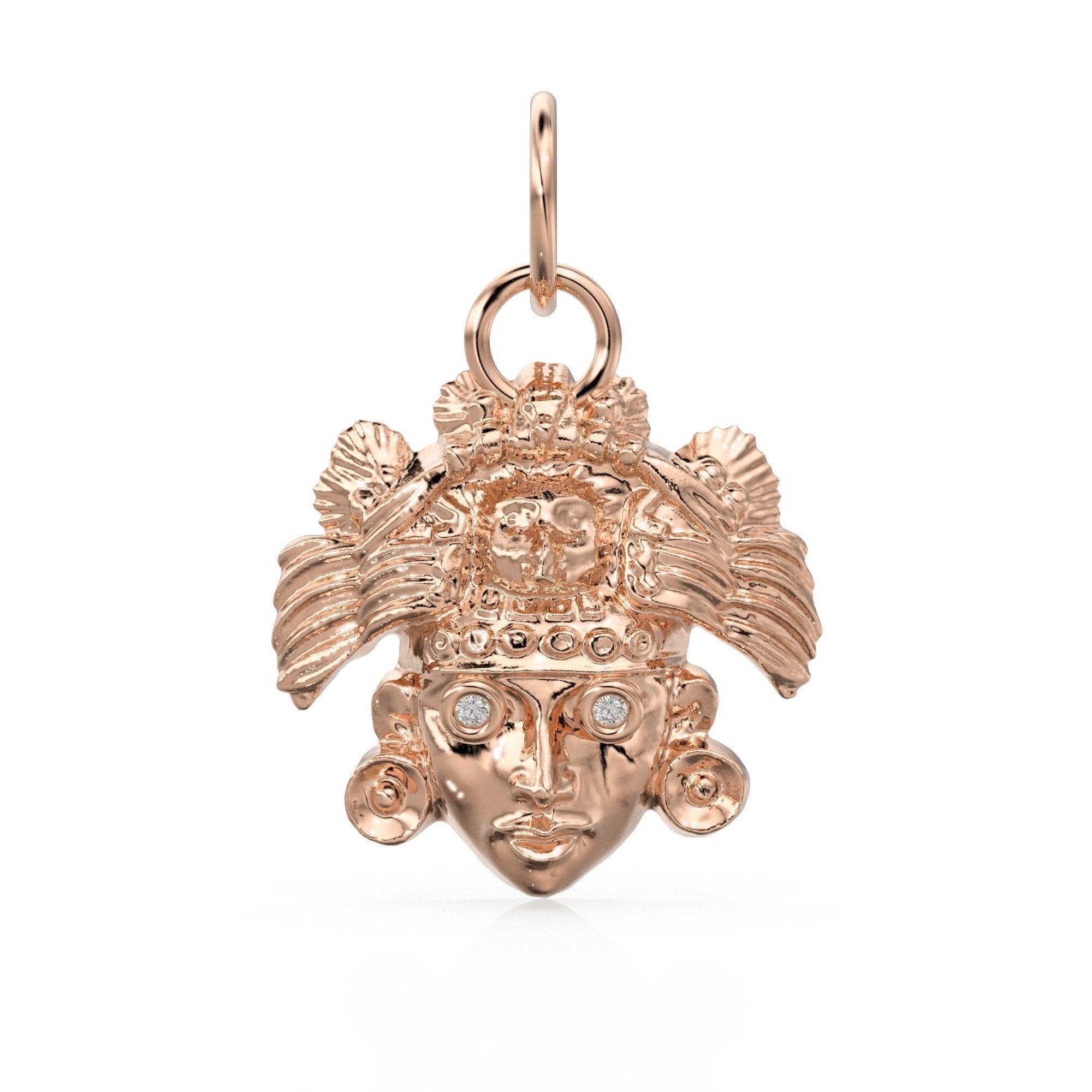 Solid gold on sale aztec pendant