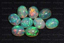 Load image into Gallery viewer, Natural Fire Multi Color Calibrated Oval Ethiopian Welo Fire Opal Cabochon - Jalvi &amp; Co.