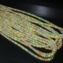 Load image into Gallery viewer, Natural Welo Fire Ethiopian Opal Smooth Rondelle Loose Gem Beads 4&quot; 3mm 5mm - Jalvi &amp; Co.