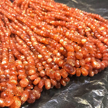 Load image into Gallery viewer, Top Quality Red Fire Sunstone AA Grade Faceted Rondelle Beads 8&quot; 5mm10mm Strand - Jalvi &amp; Co.
