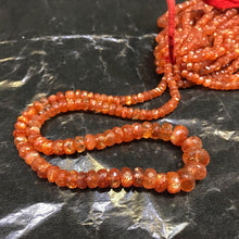 Load image into Gallery viewer, Top Quality Red Fire Sunstone AA Grade Faceted Rondelle Beads 8&quot; 5mm10mm Strand - Jalvi &amp; Co.