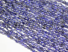 Load image into Gallery viewer, Water Sapphire Blue Iolite Smooth Oval Gemstone Loose Beads Strand 14&quot; 5mm - Jalvi &amp; Co.